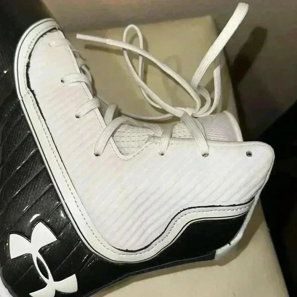 Under Armour, high top football cleats